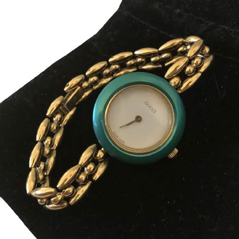 gucci womens gold bangle bezel watch|gucci interchangeable bezel.